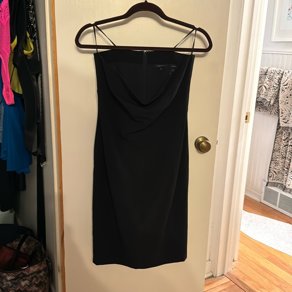 Black strapless day dress.